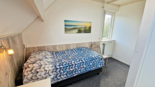 Postel nebo postele na pokoji v ubytování DCL03 modern holiday home with terrace
