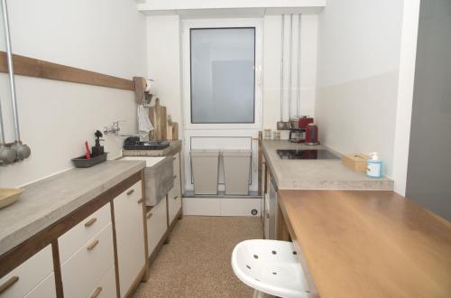 Kuchyň nebo kuchyňský kout v ubytování Syntagma View Apartment