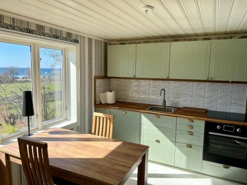 Kuchyň nebo kuchyňský kout v ubytování Klinta sea view