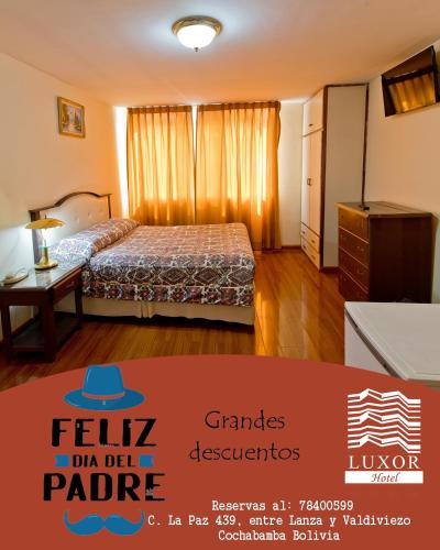 a hotel room with a bed and a dresser and a table at Hotel Luxor in Cochabamba