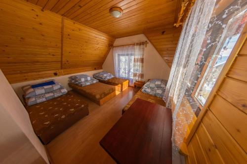 an overhead view of a living room in a log cabin at Agroturystyka na szlaku in Lubomierz