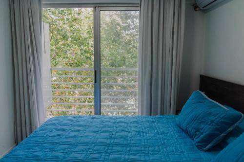 Postel nebo postele na pokoji v ubytování Quijano Hotel - Aparts & Suites