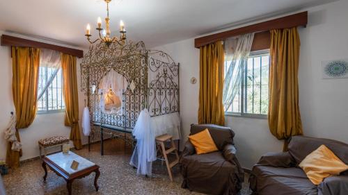 Coin salon dans l'établissement Villa Fablas Periana by Ruralidays