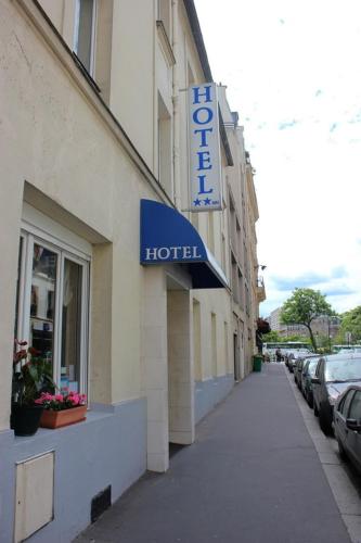 a hotel sign on the side of a building at Hôtel Neptune Place d'Italie in Paris