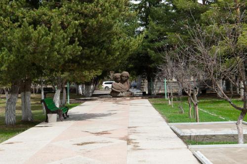 a statue of an elephant sitting in a park at Jermuk Ararat Health SPA in Jermuk