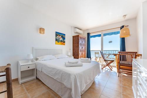 Postel nebo postele na pokoji v ubytování Ventana al mar
