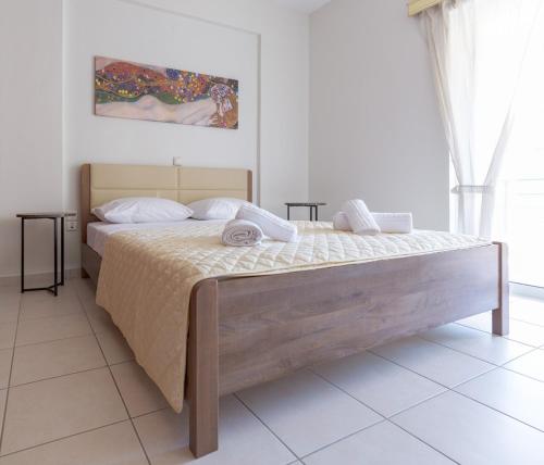 a bedroom with a large bed in a room at Seaside Villa in Preveza