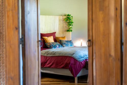 Postel nebo postele na pokoji v ubytování Ô Chambres d'Hôtes