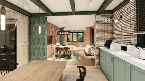 a kitchen and dining room with a table and chairs at Glamping Lauwersmeer in Vierhuizen