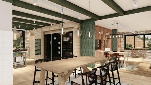 a dining room with a large wooden table and chairs at Glamping Lauwersmeer in Vierhuizen
