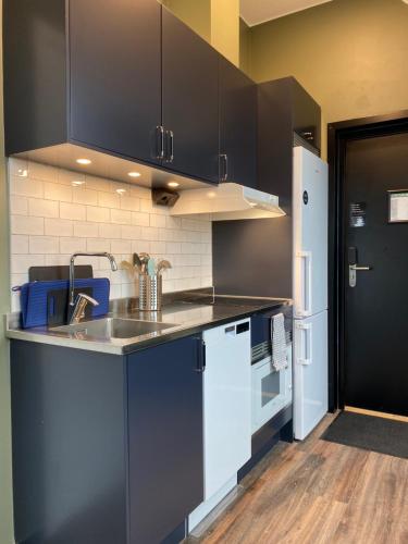 Η κουζίνα ή μικρή κουζίνα στο Magnolia House Sollentuna