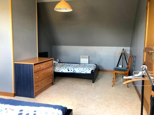 Postel nebo postele na pokoji v ubytování Grande maison proche de Paris