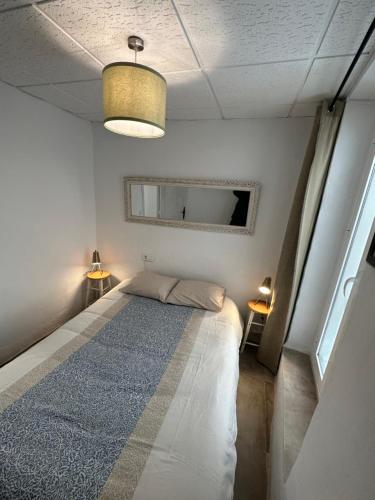 En eller flere senge i et værelse på Charming apartment in historic center Tarifa