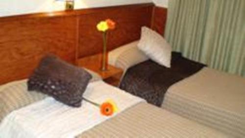 Katil atau katil-katil dalam bilik di Hostal El Carmen