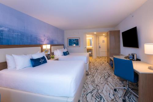 Ein Bett oder Betten in einem Zimmer der Unterkunft Mohegan Pennsylvania Casino Resort - Adults Only