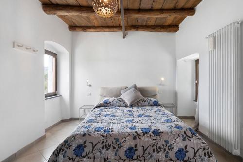 Postelja oz. postelje v sobi nastanitve Cà Gianca