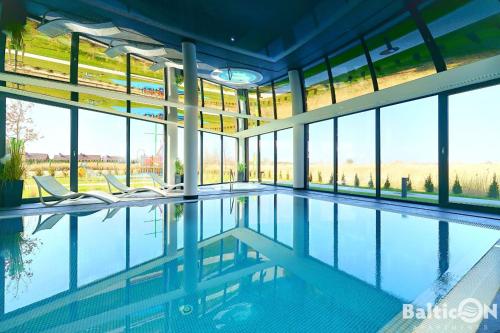 Apartamenty BalticON Westin House -luksusowy 70m2 , basen pool, sauna, parking inklusive