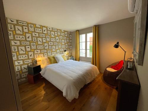 Postel nebo postele na pokoji v ubytování Le Chic à Barbizon