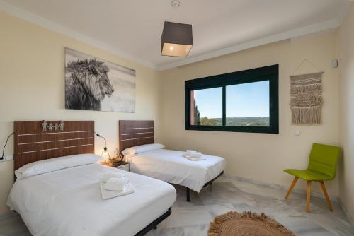 A bed or beds in a room at Colinas el Hacho 2320 Sea view