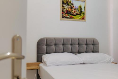 Ένα ή περισσότερα κρεβάτια σε δωμάτιο στο Hotel CasaMia
