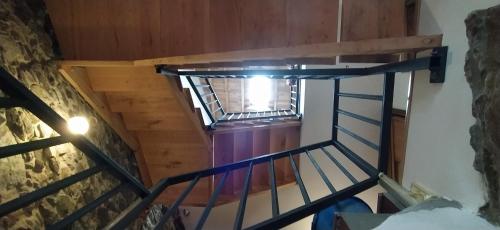 Palanda nebo palandy na pokoji v ubytování Casa A Feira