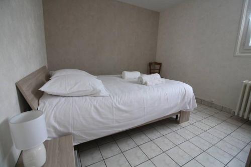 Posteľ alebo postele v izbe v ubytovaní Joli T3 rénové / Wifi / Grand parking