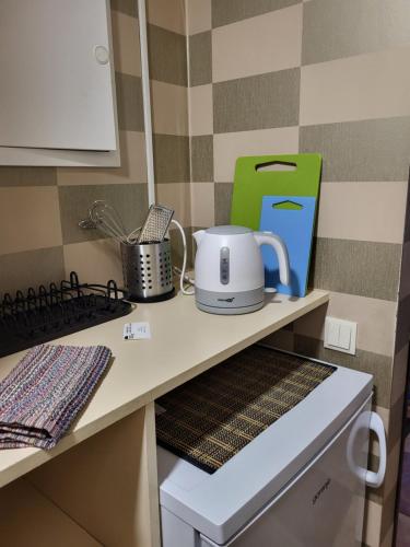 Virtuvė arba virtuvėlė apgyvendinimo įstaigoje Classic Apartment