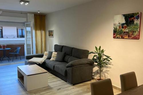 a living room with a couch and a table at ACENI in Ciudad Real