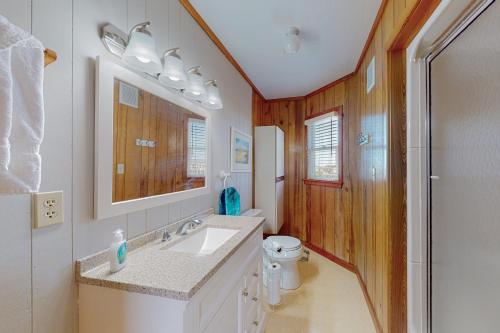 a bathroom with a sink and a toilet at Stellar Vista in Avon