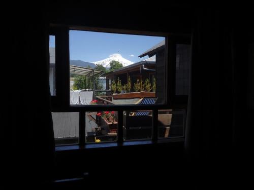 a view out of a window of a house at B&B HMüller in Pucón