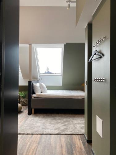 Ένα ή περισσότερα κρεβάτια σε δωμάτιο στο Magnolia House Sollentuna