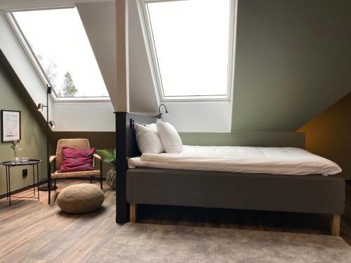 Ένα ή περισσότερα κρεβάτια σε δωμάτιο στο Magnolia House Sollentuna