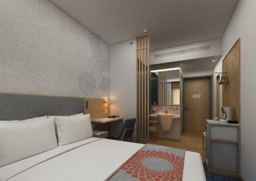 Katil atau katil-katil dalam bilik di Holiday Inn Express Gurugram Sector 50 by IHG