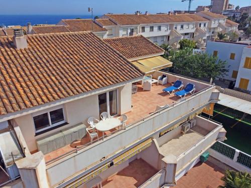 an aerial view of a house with a swimming pool at CABO DE PALOS ATICO LA GALERA parking in Cabo de Palos