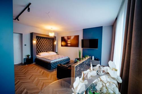 Postel nebo postele na pokoji v ubytování Apartament Pod Skrzydłami Aniola