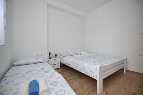 Ένα ή περισσότερα κρεβάτια σε δωμάτιο στο APARTMAN STAŠA
