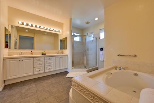 a large bathroom with a tub and a shower at Luxury Encinitas Vacation Rental with Private Pool in Encinitas