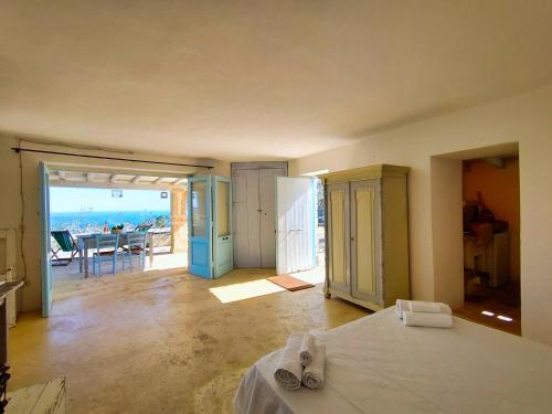 A bed or beds in a room at Le Pajare di Marina Serra di Casa Camilla Journey
