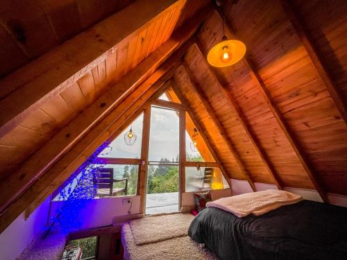 Postel nebo postele na pokoji v ubytování Palu Ecoaldea, Cabañas glamping en medio del bosque