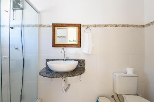 Bilik mandi di Village Itaúna Inn - Casas de Temporada para Famílias