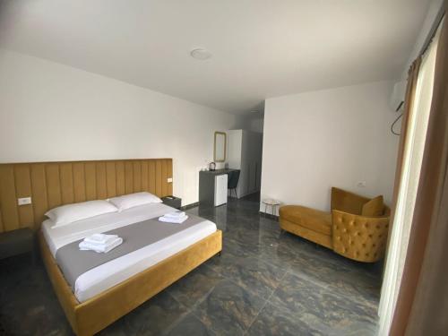 Postel nebo postele na pokoji v ubytování Hotel LEODORI 3 suites