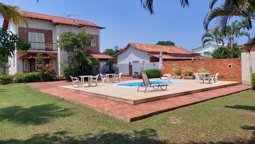 Kolam renang di atau dekat dengan Village Itaúna Inn - Casas de Temporada para Famílias