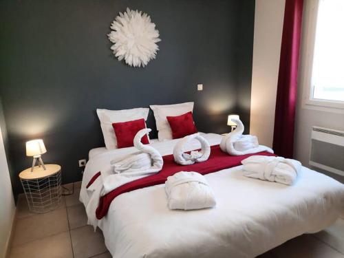 Ένα ή περισσότερα κρεβάτια σε δωμάτιο στο L'Ardétente