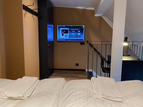 Ένα ή περισσότερα κρεβάτια σε δωμάτιο στο Magnolia House Sollentuna