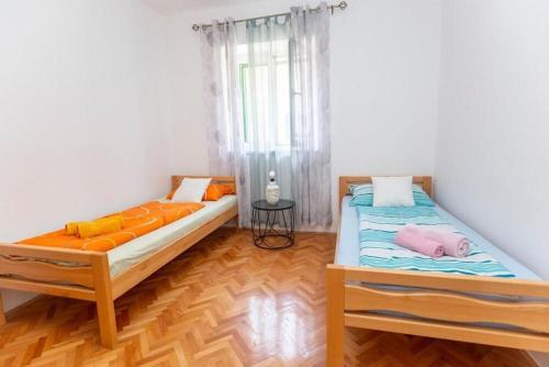 Posteľ alebo postele v izbe v ubytovaní Apartment Roko in Center