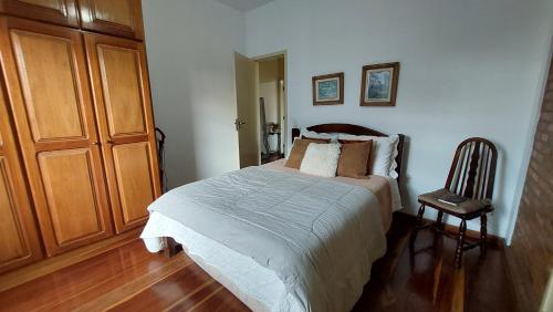 Katil atau katil-katil dalam bilik di Village Itaúna Inn - Casas de Temporada para Famílias