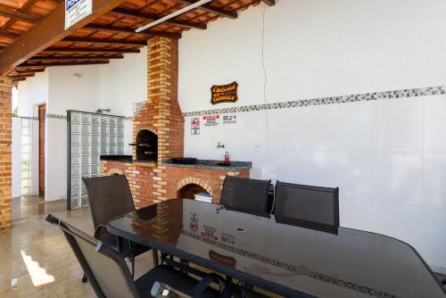 Ruang duduk di Village Itaúna Inn - Casas de Temporada para Famílias