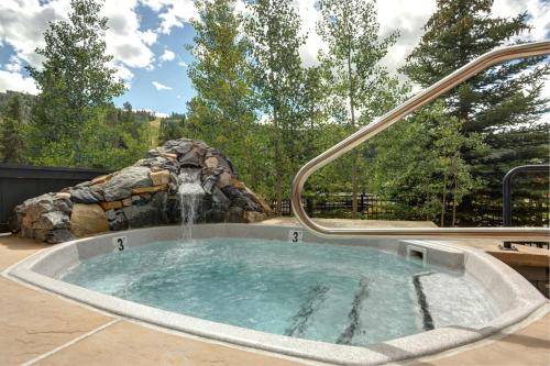 a hot tub with a water fountain at Jackpine & Black Bear Condominiums by Keystone Resort in Keystone