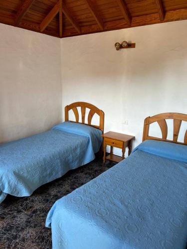 Ліжко або ліжка в номері Casa Antigua