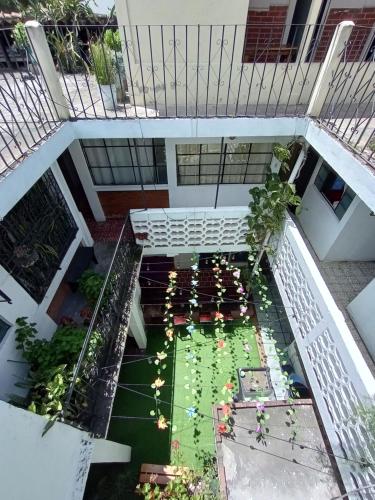 Κήπος έξω από το Hotel El Pasaje